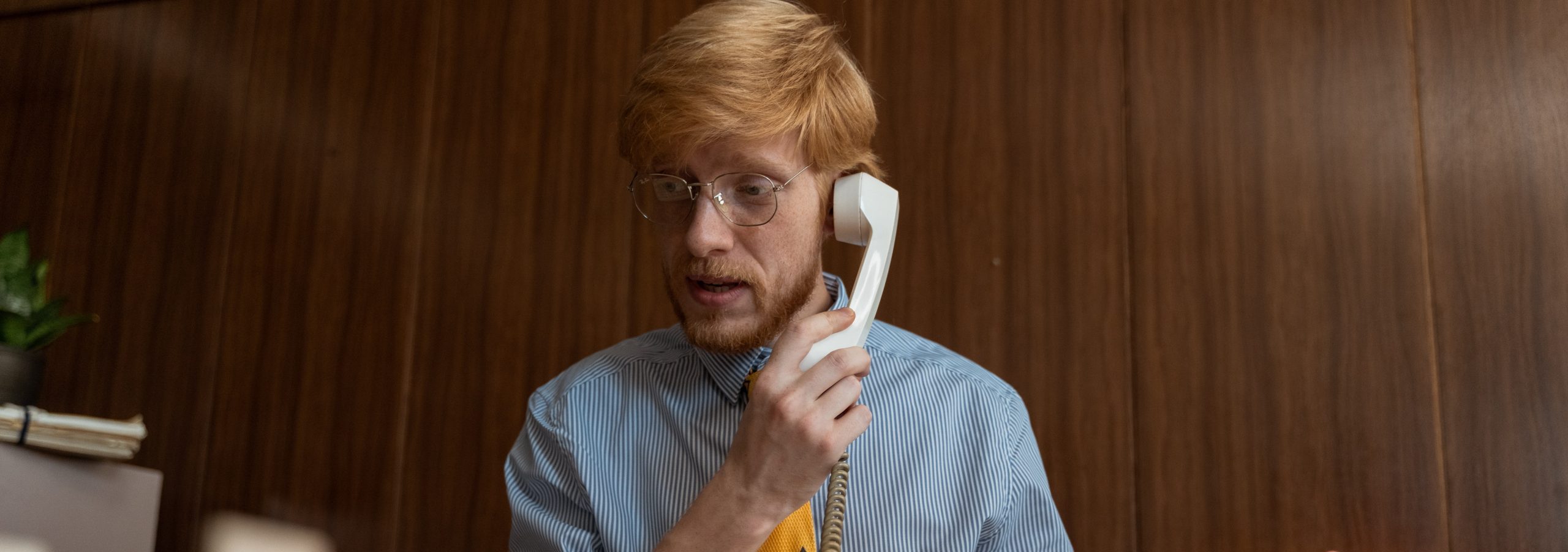 Man talking on phone about payday loans are legitimate