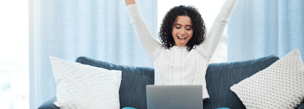 woman celebrating for her cash advance same day online