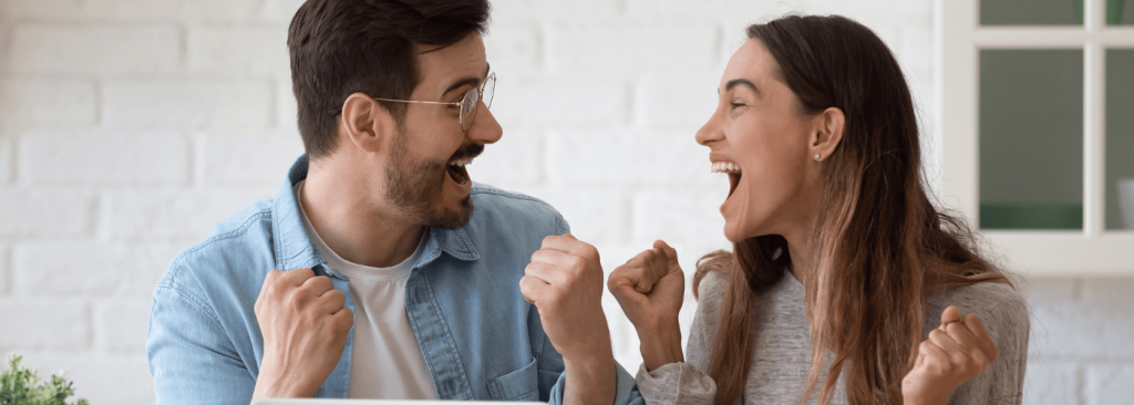 A couple is celebrating for their small payday loan online no credit check